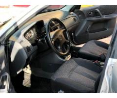 Mazda 323 1.4 2002 - Изображение 7/10